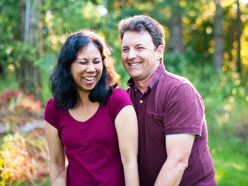 Mature Laughing Mulit Ethnic Husband and Wife