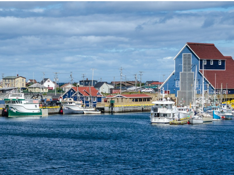 Fishing boats docked in villages' harbours in Bonavista. stock photo