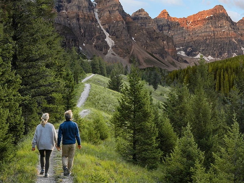 Senior couple walking in the mountains