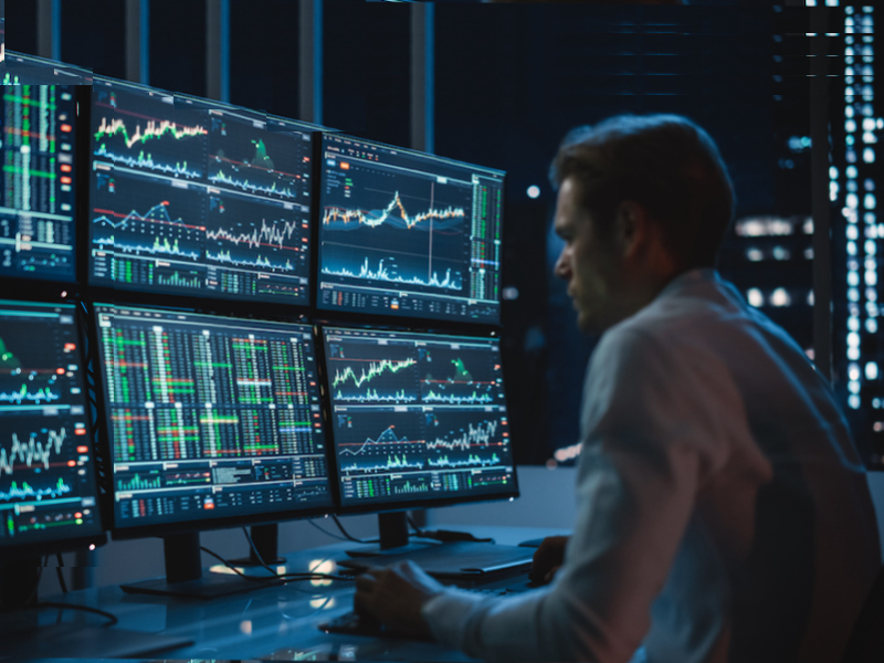 Stock trader at computer