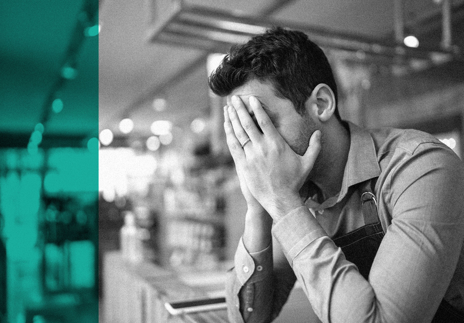 Worried man holding hands to his head