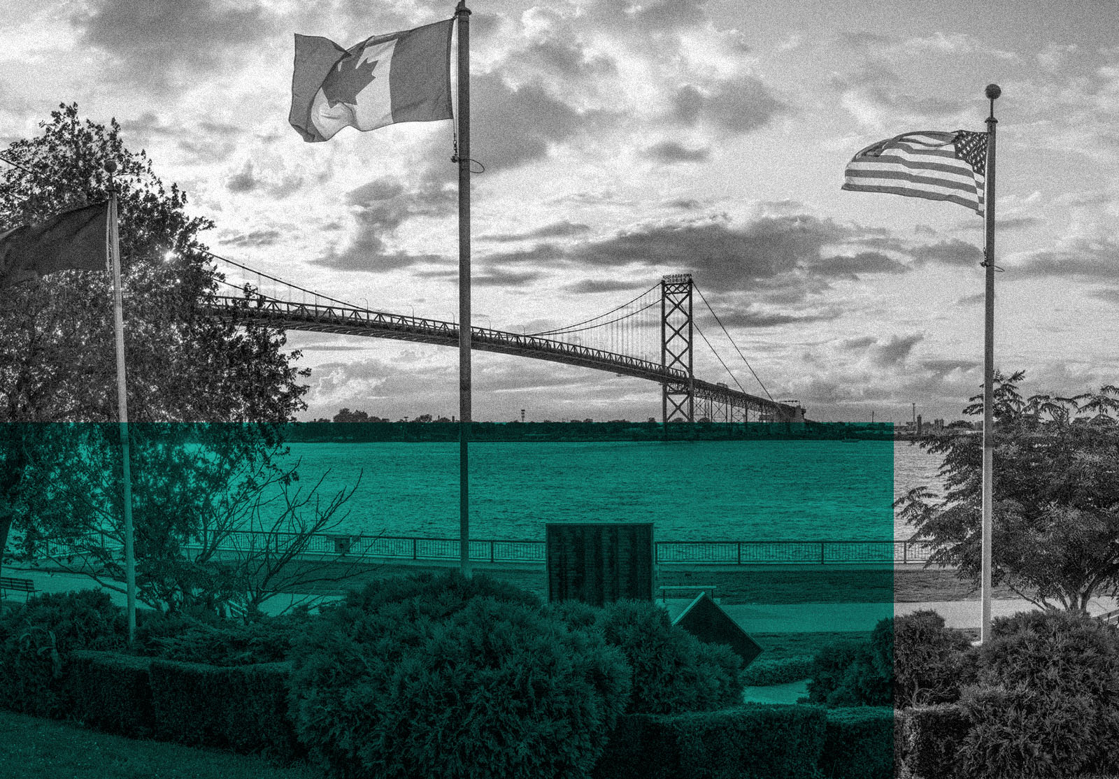 The Ambassador bridge links Detroit, Michigan with Windsor, Ontario. It is one of the busiest trade routes in North America. This photo was taken from Windsor, Ontario, Canada, facing North-West towards Detroit.