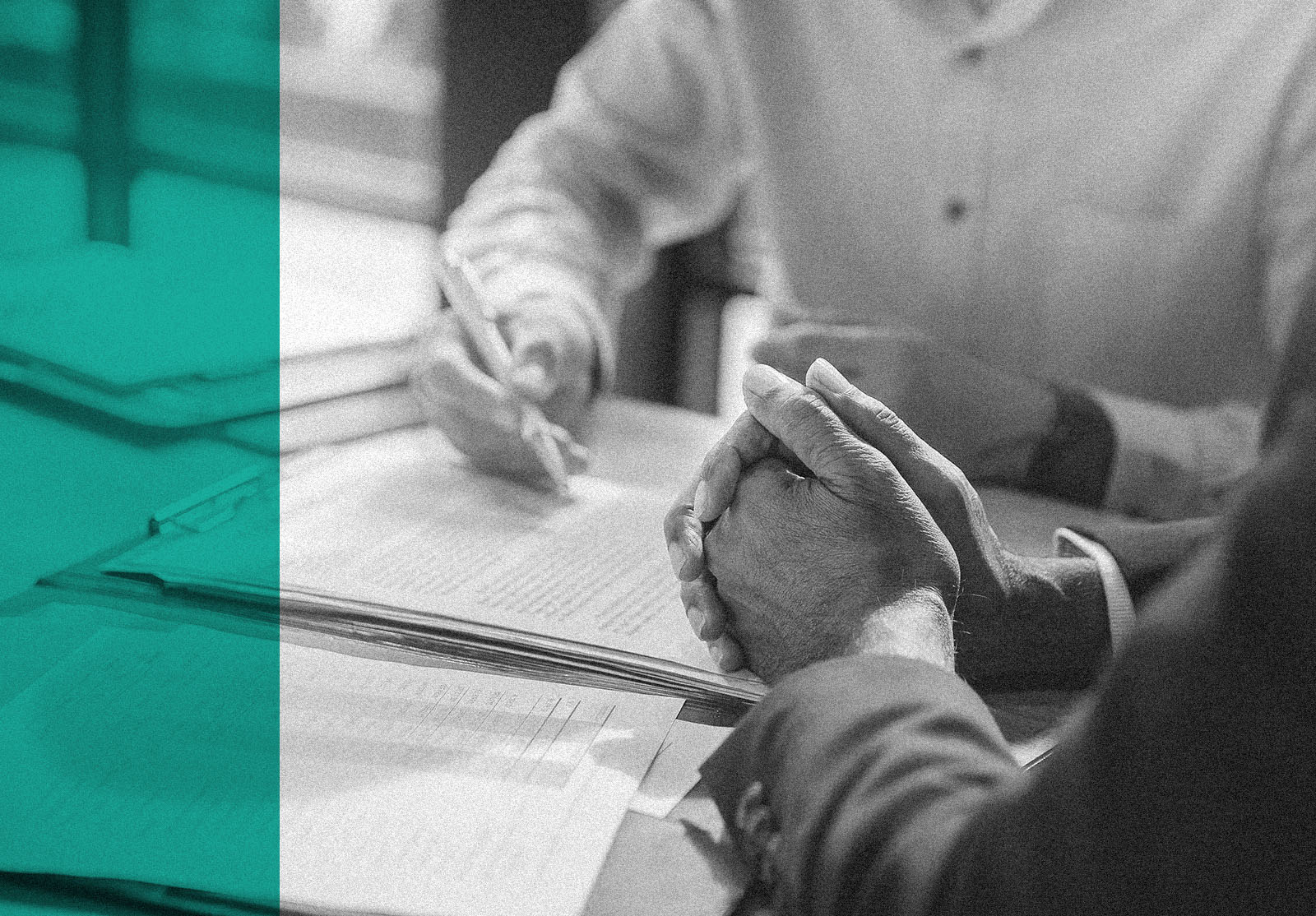 Businessman reading documents at meeting