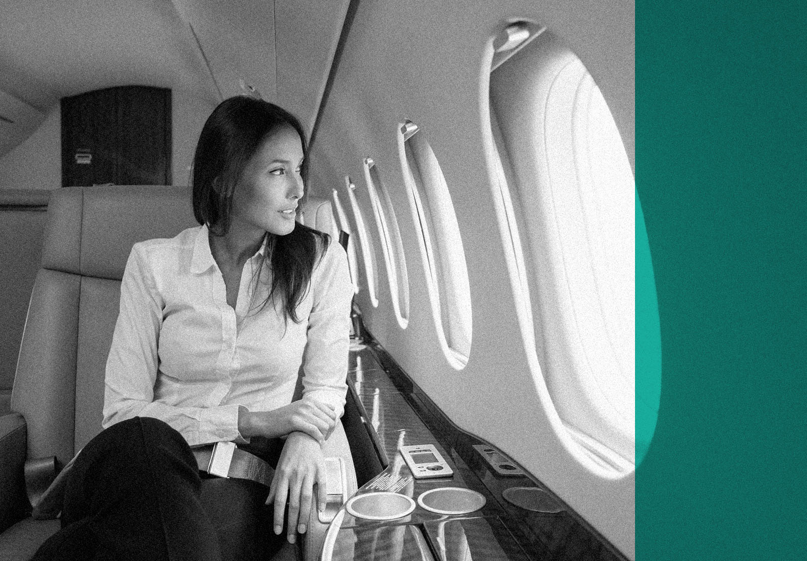 Business woman traveling in a private jet