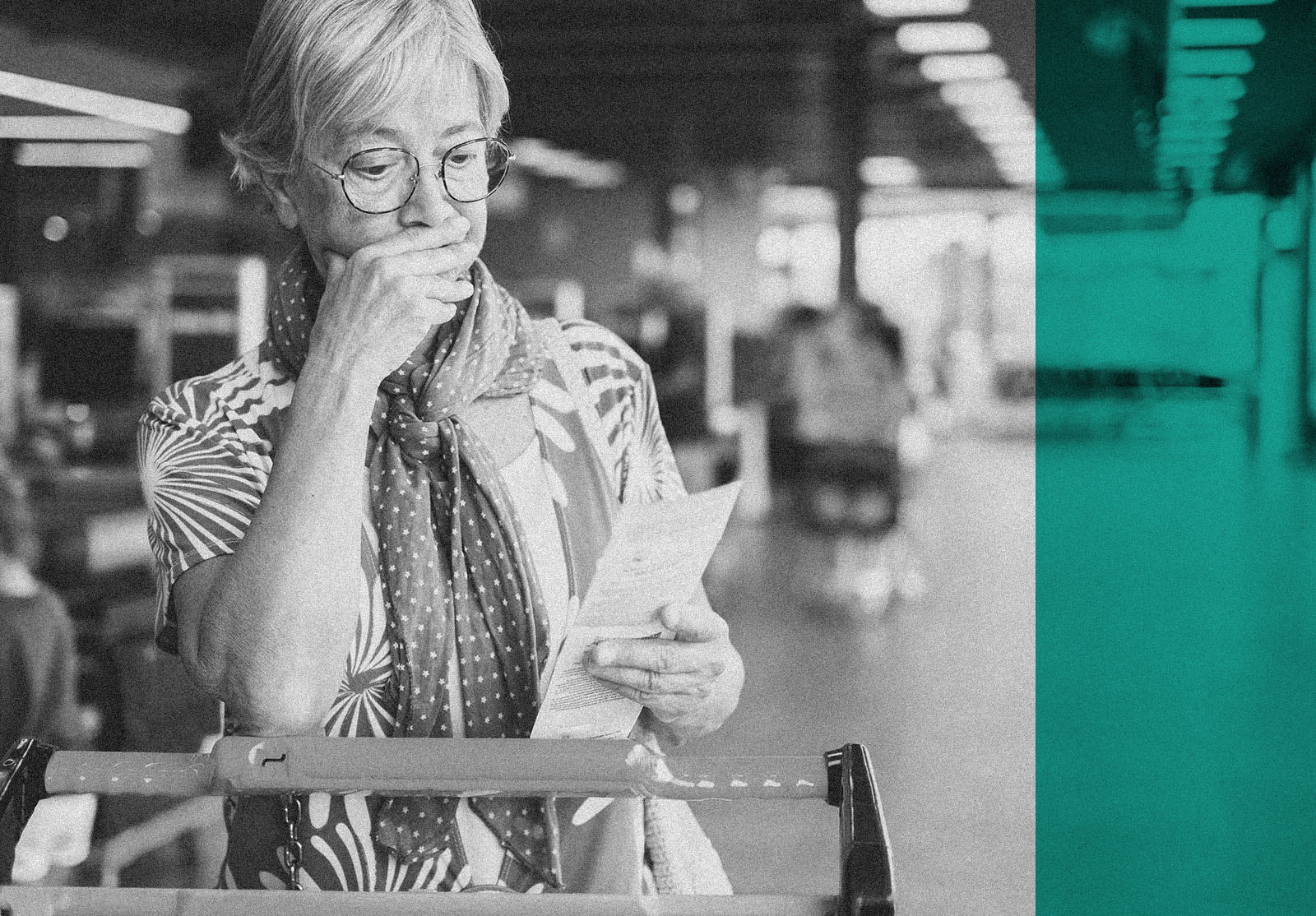 Senior woman in the supermarket checks her grocery receipt looking worried about rising costs