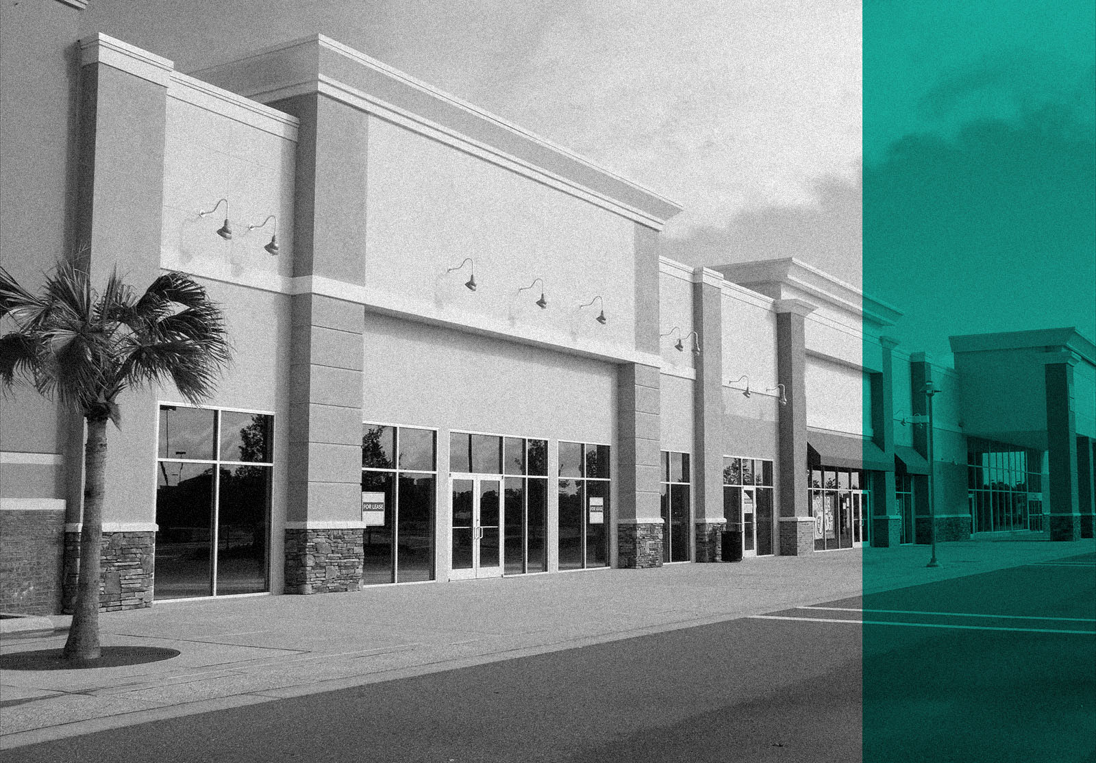 Empty strip mall with pastel stucco and stone accents