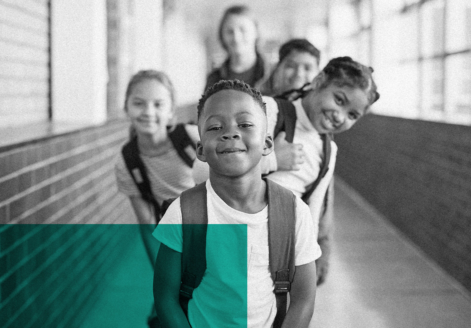 Group of happy kids in school