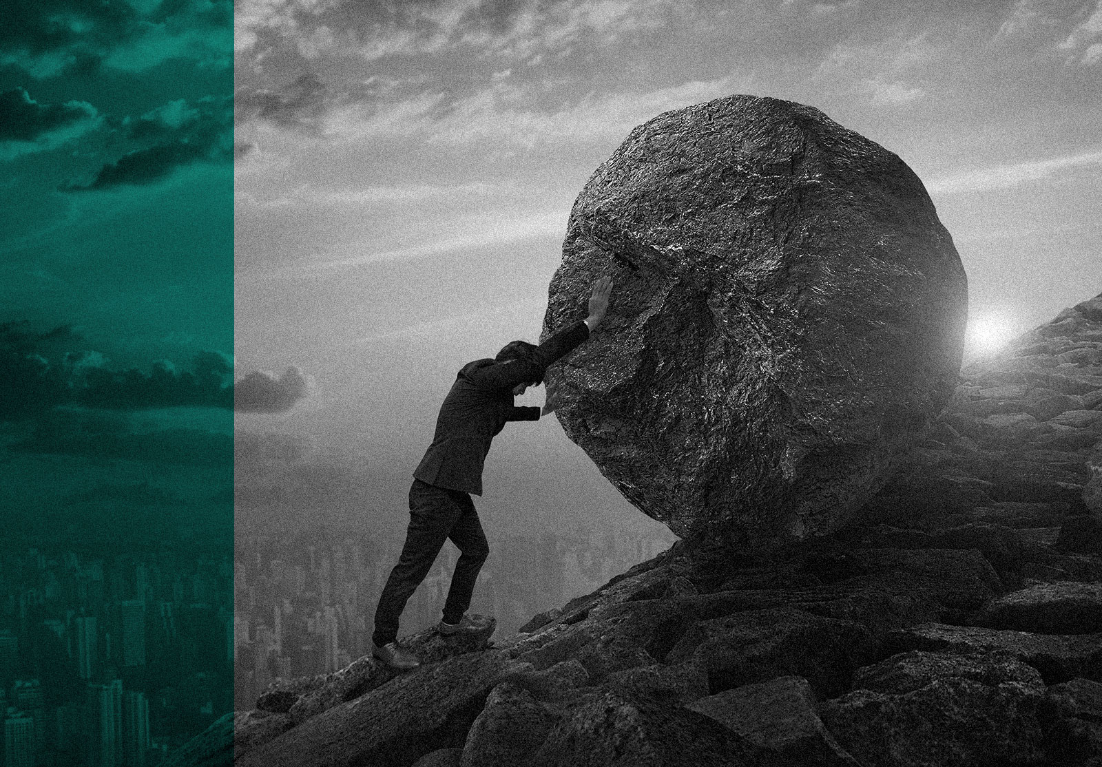 Man pushing large boulder up a mountain side