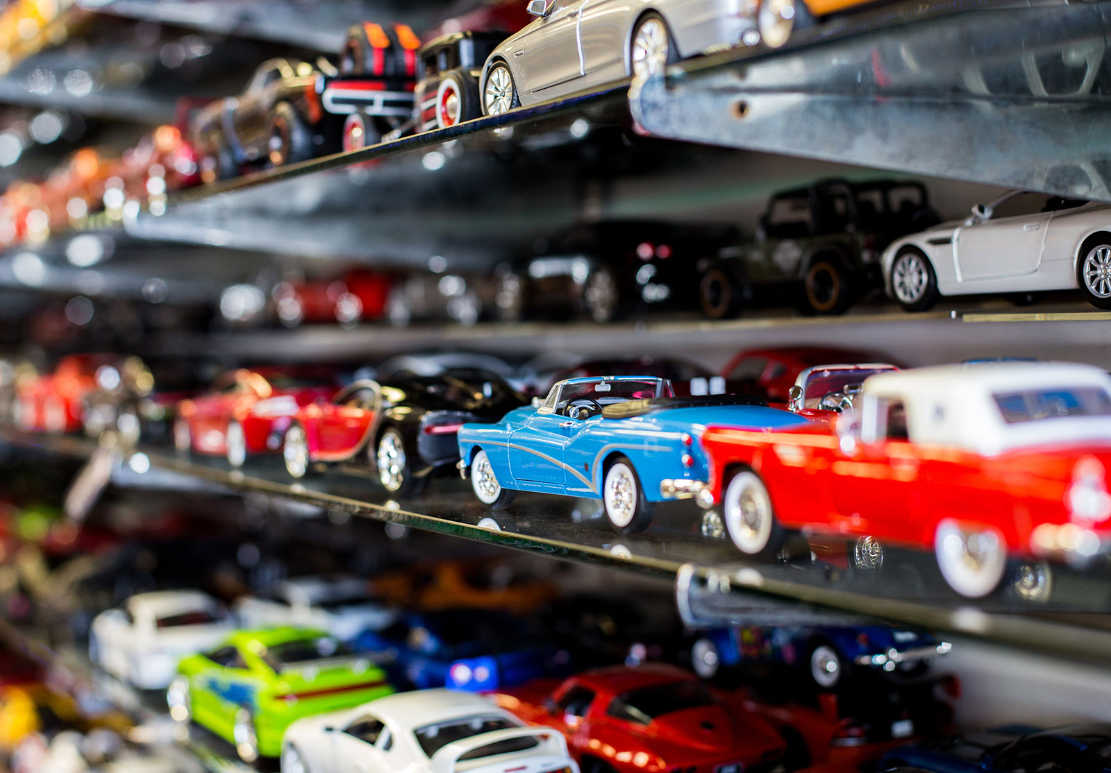 Toy cars on a shelf