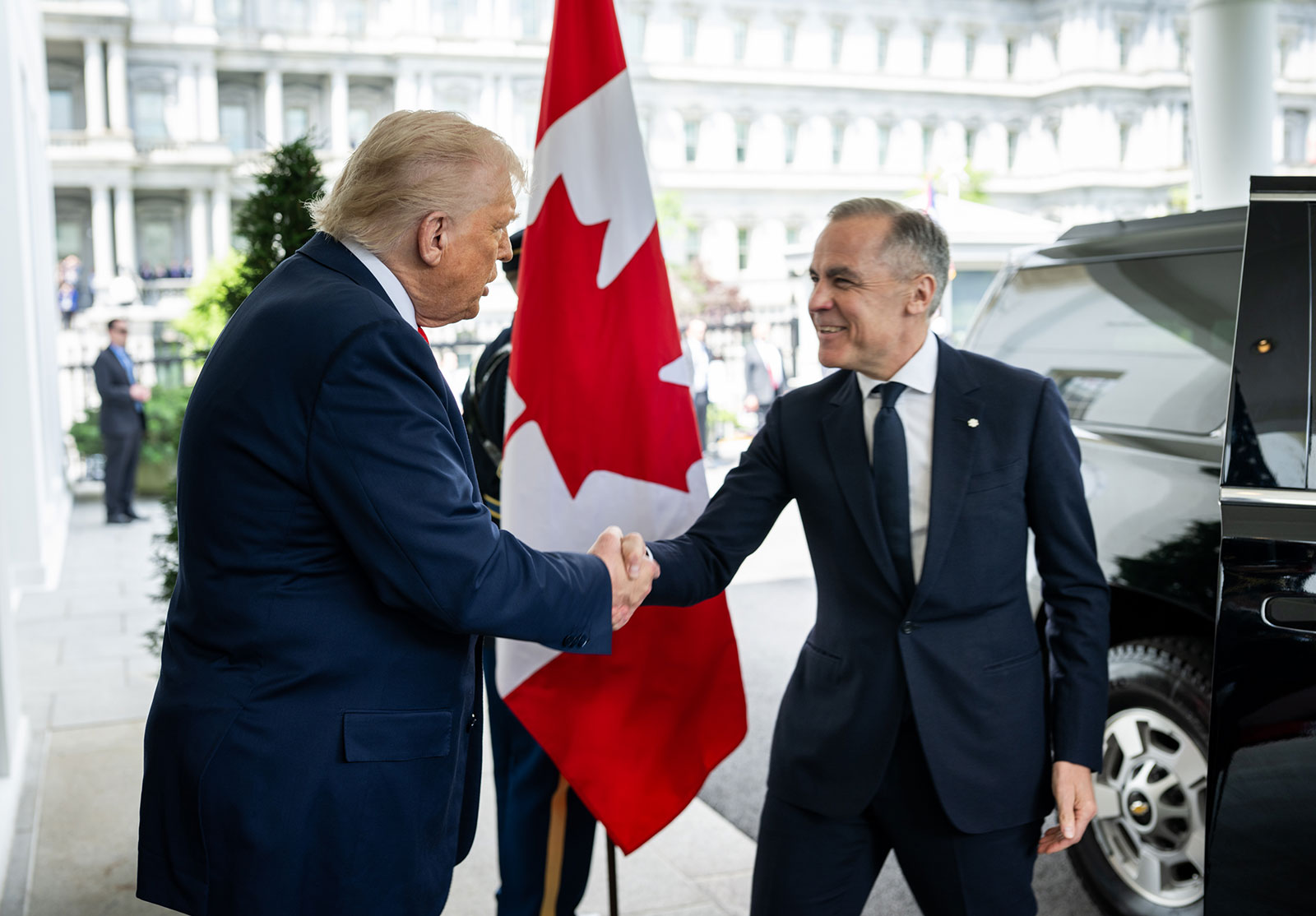 U.S. president Donald Trump and Canadian prime minister Mark Carney shake hands
