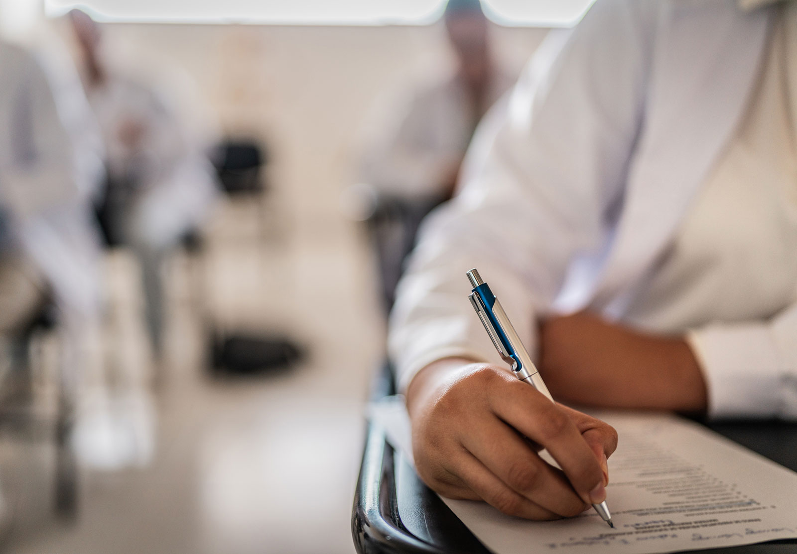 Taking notes in a classroom