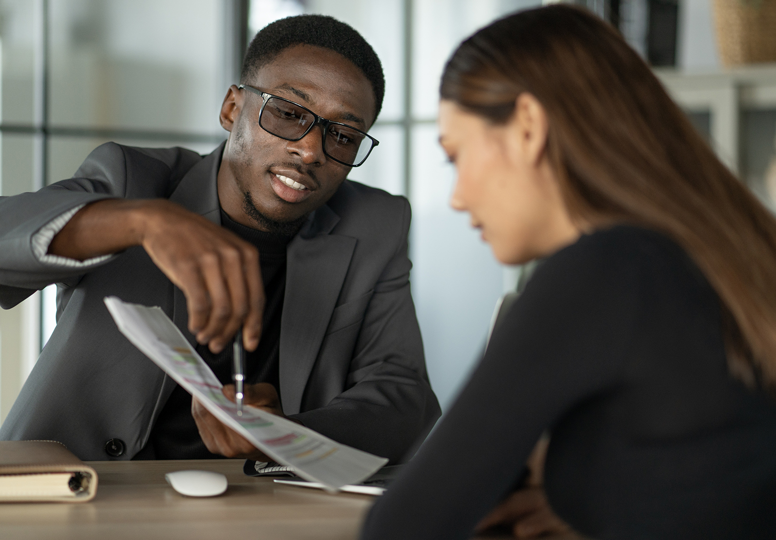 Financial advisor talking to customer