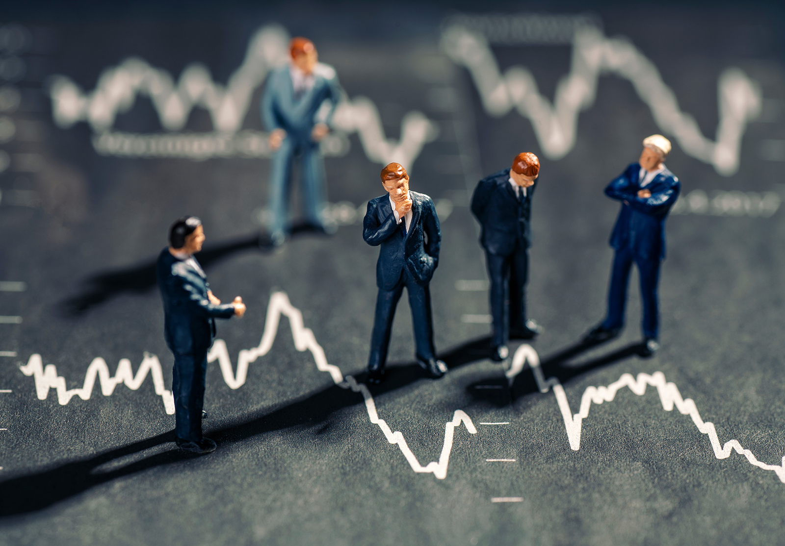 Businessmen and falling stock prices