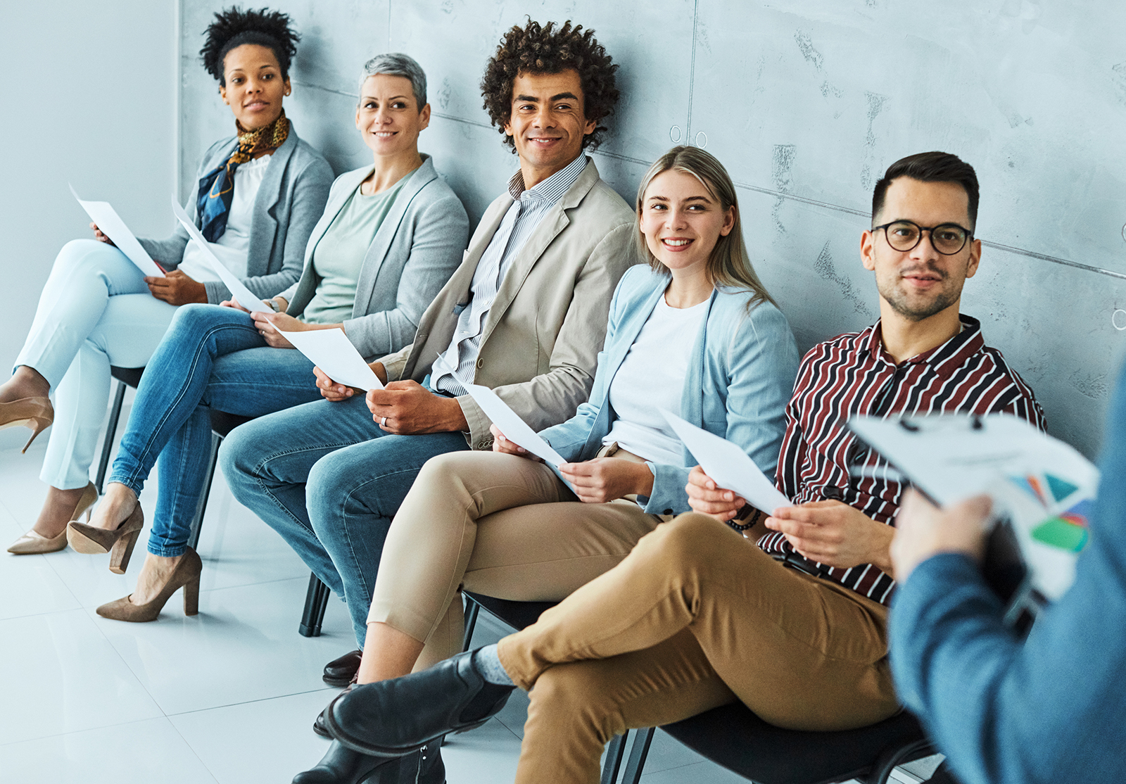 man business chair sitting waiting woman businessman candidate recruitment businesswoman office businessperson job young interview line