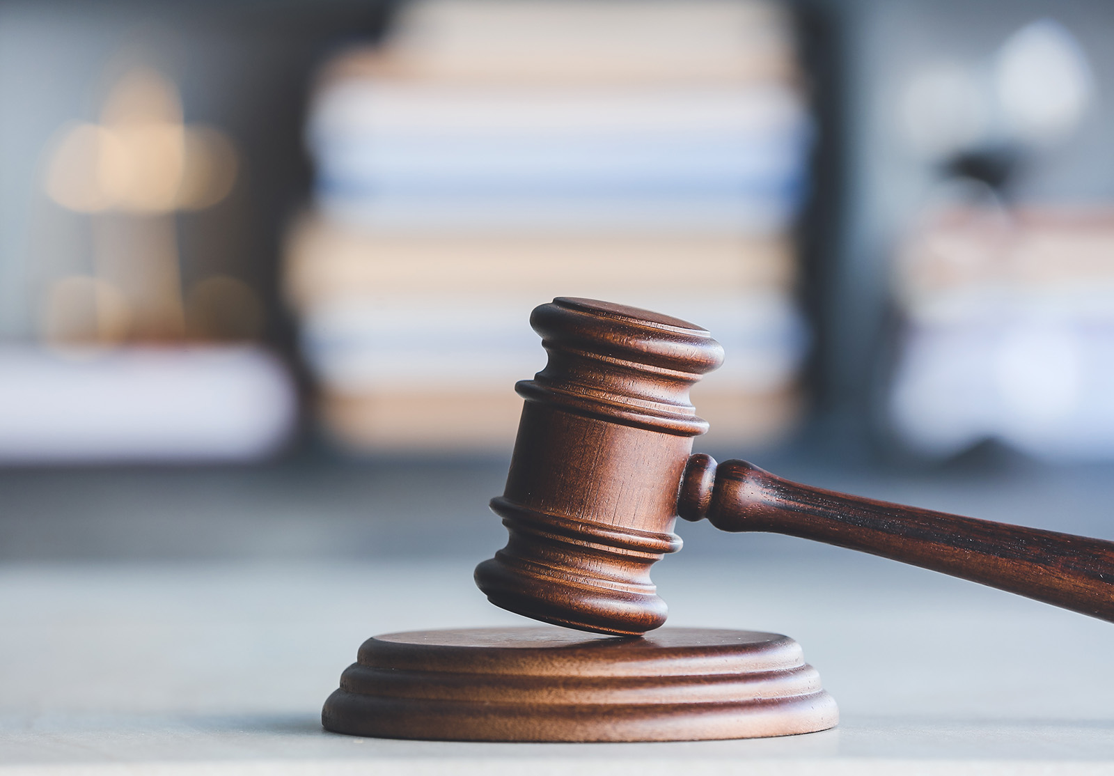 Judge's gavel on table in office